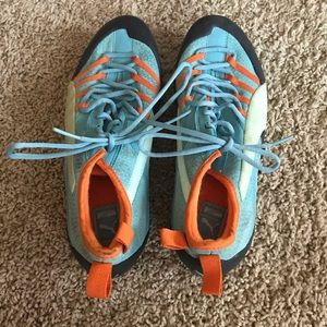 Pair of Blue and orange Puma climbing shoes